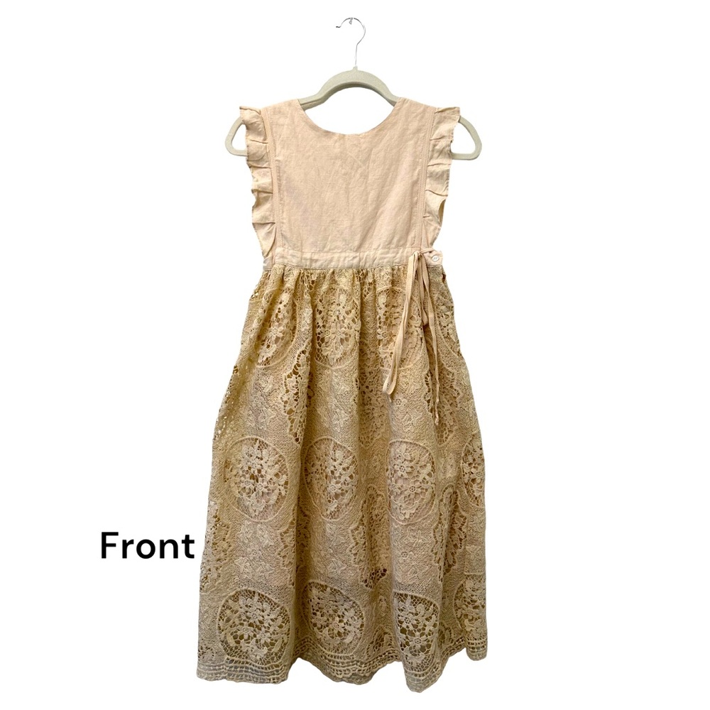 Girl lining dress, comfortable and easy to move around in. Size 10. Lace dress.
